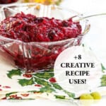 Small clear bowl with cranberry sauce and a clear glass spoon on a holiday towel.