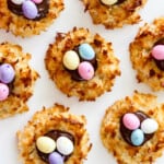 An overhead view of fresh baked and decorated Easter dessert coconut macaroon cookies.