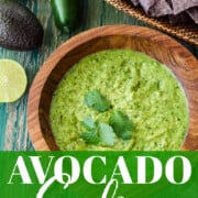 A graphic for avocado salsa with blue corn tortilla chips in a basket on a green vintage table.