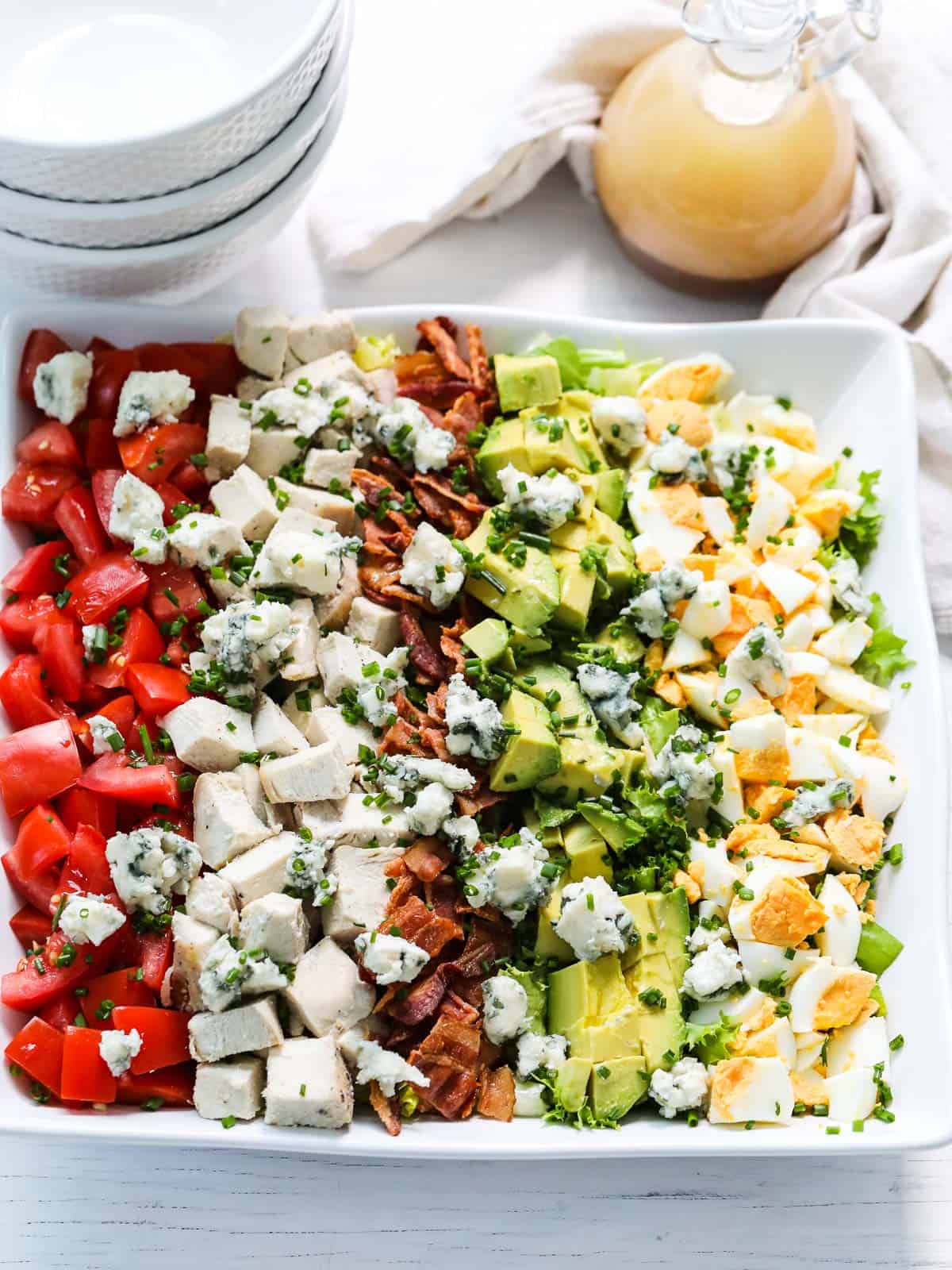 https://www.delicioustable.com/wp-content/uploads/2021/06/Cobb-Salad-hero-shot.jpg