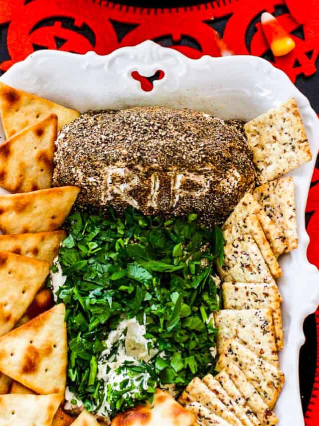 A tombstone shaped Halloween dip served with crackers.