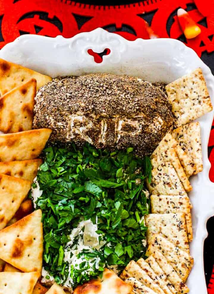 A tombstone shaped Halloween dip served with crackers.