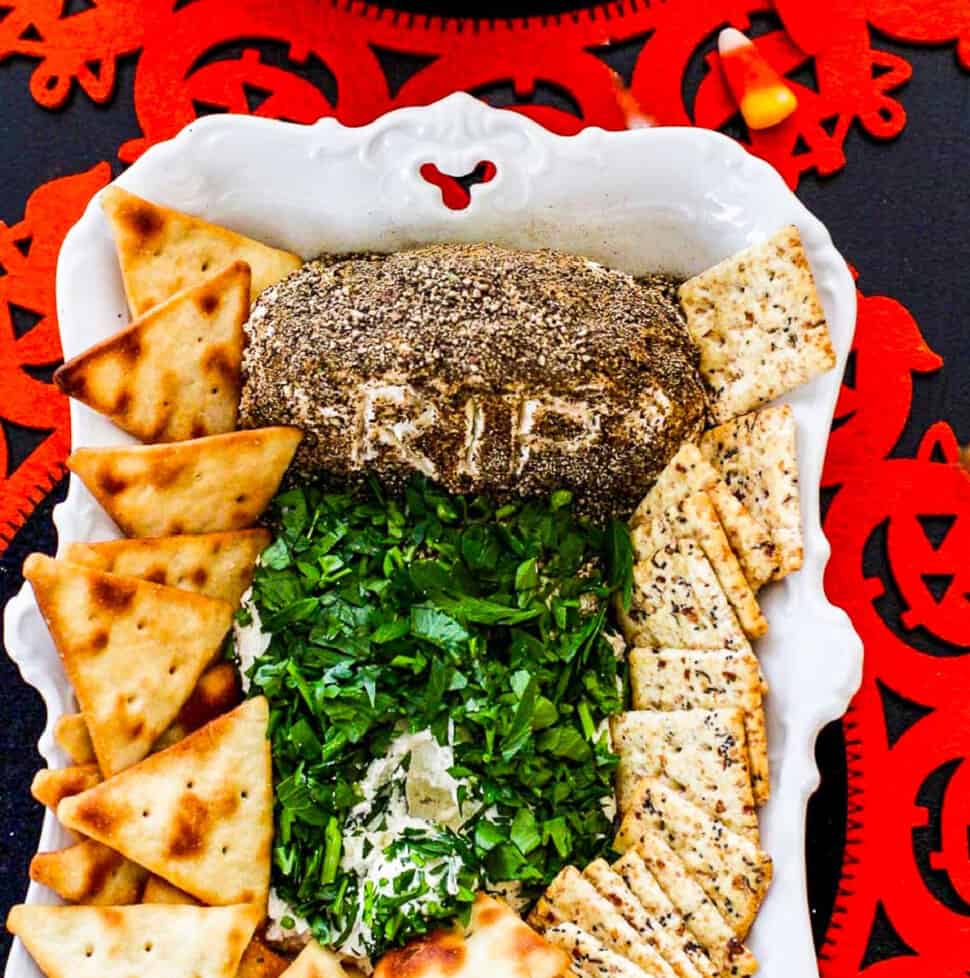 A tombstone shaped Halloween dip served with crackers.