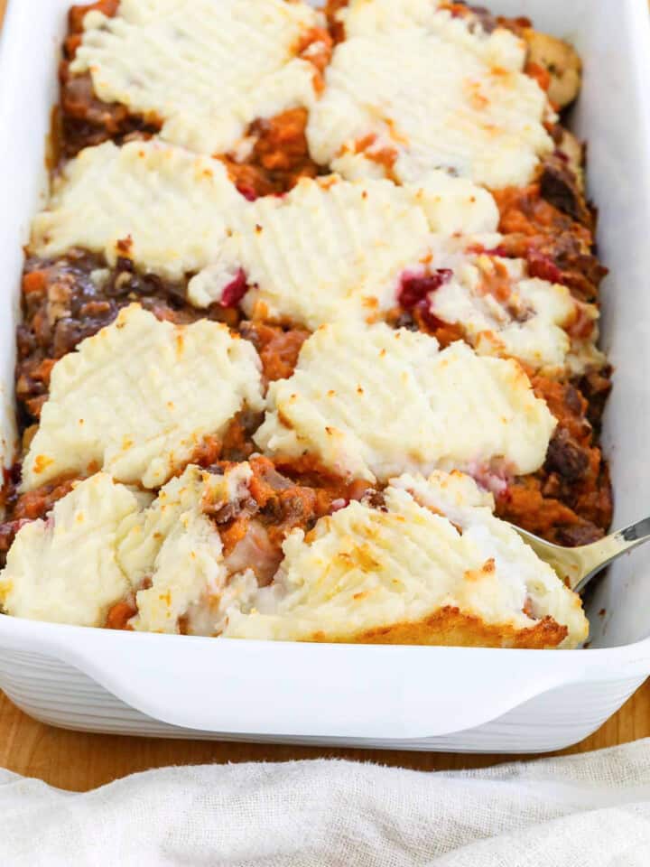 A baked white dish of turkey leftover shepherd's pie.