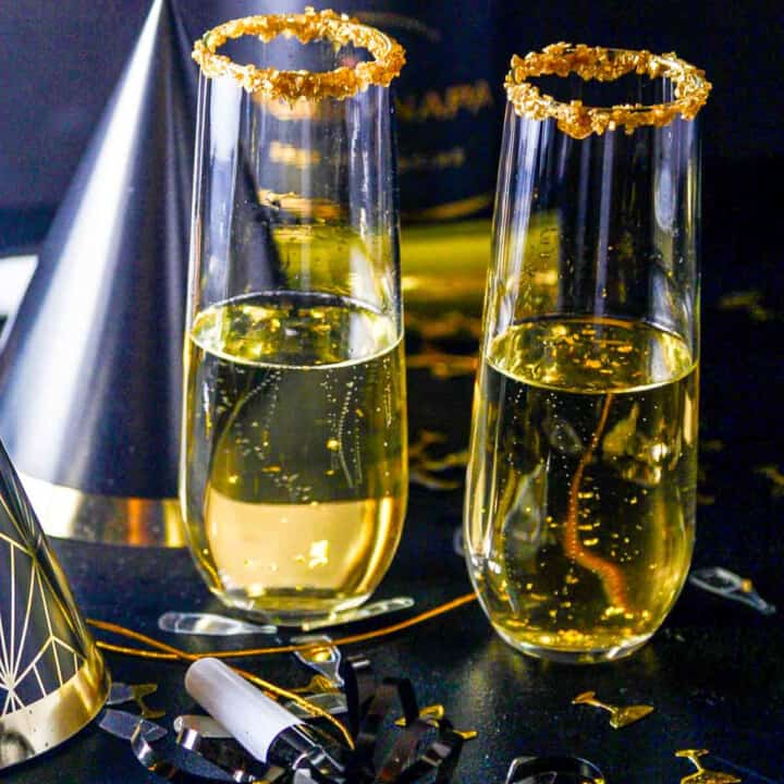 A New Years Eve party with champagne cocktails made with Goldschlager gold liquor.