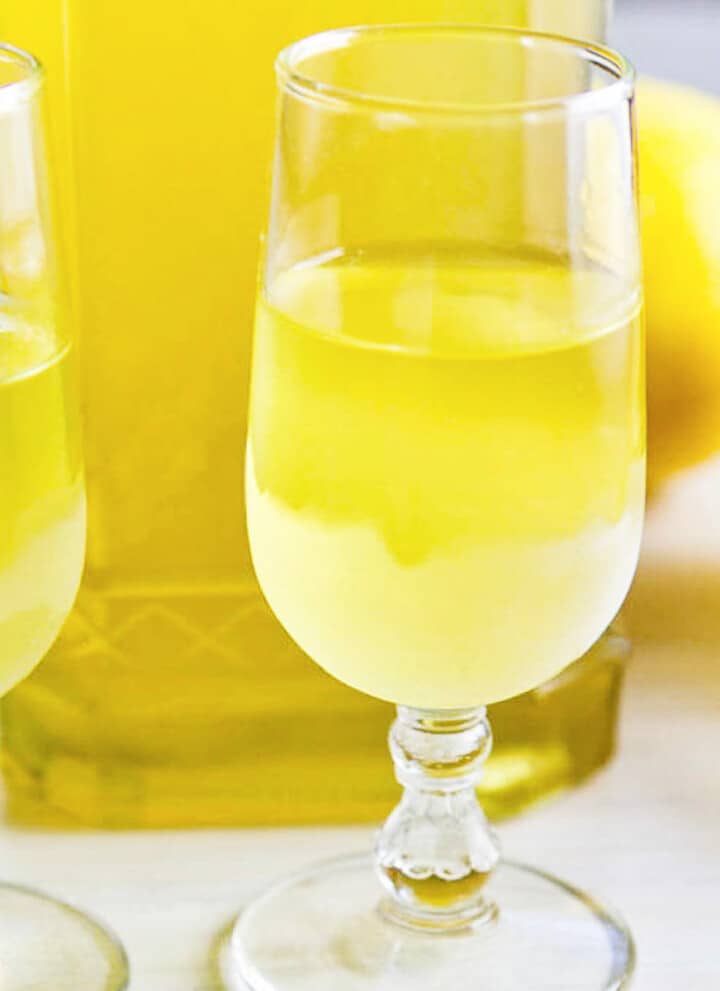 Two small glasses of icy cold limoncello (lemoncello) ready to sip.