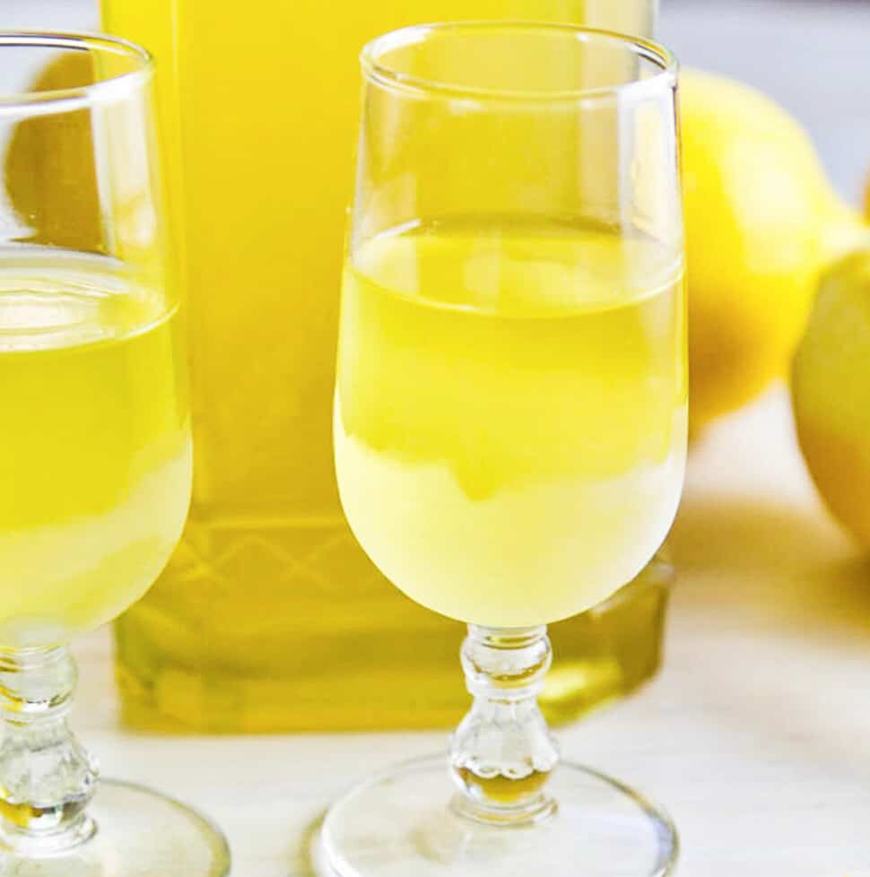 Two small glasses of icy cold limoncello (lemoncello) ready to sip.