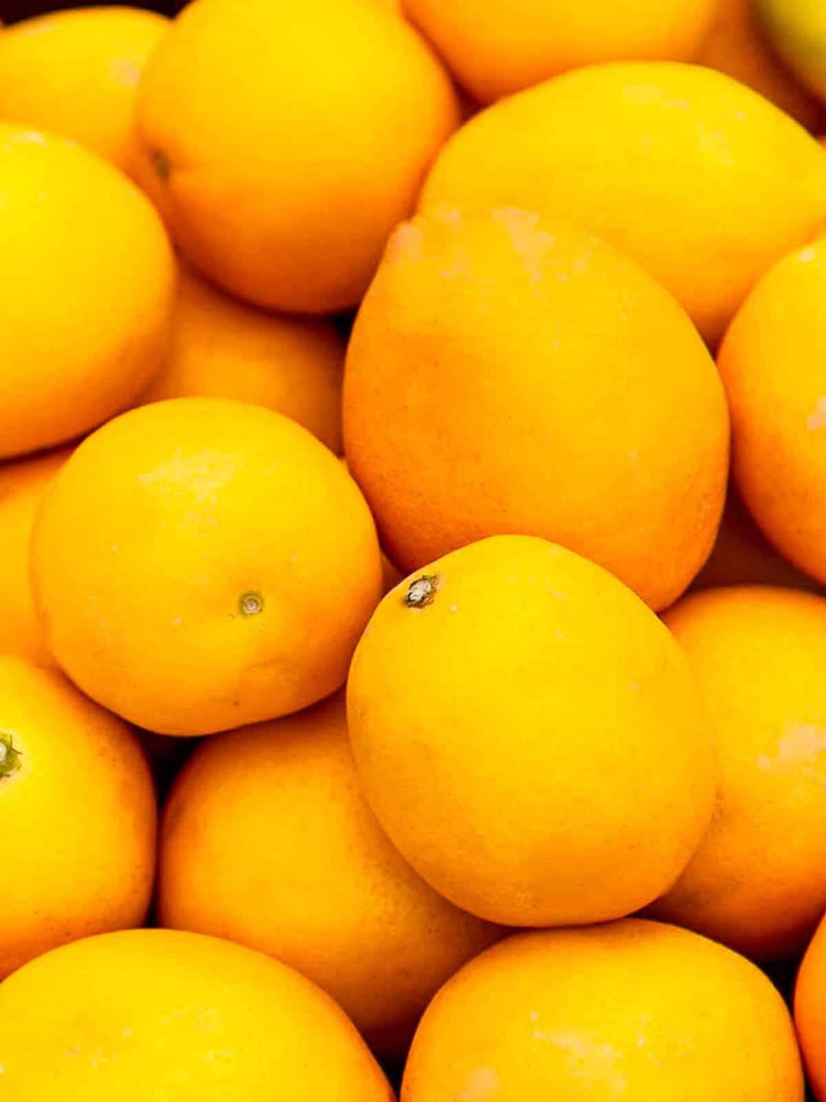 A pile of fresh lemons ready to use in a recipe.