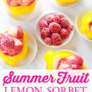 Bright yellow lemons carved out and filled with raspberry strawberry lemon sorbet as a summer dessert.