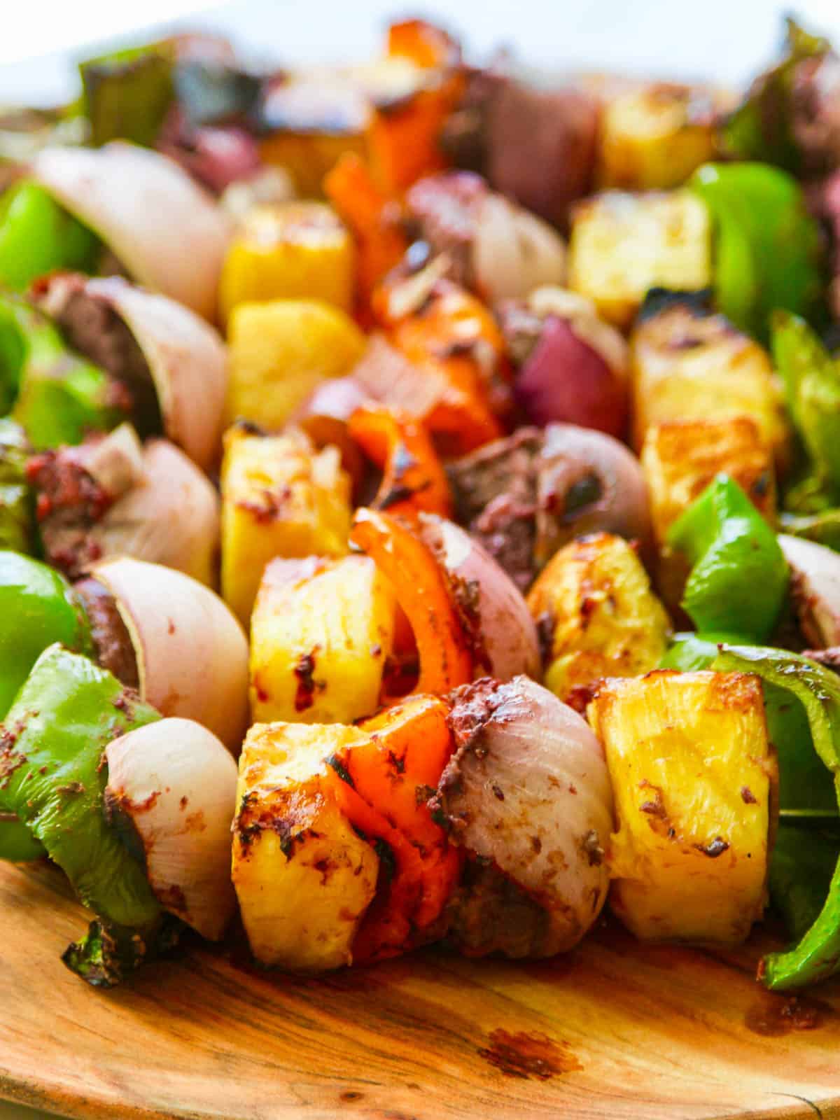 Grilled skewer shish kabobs made with beef, bell pepper, pineapple, and onion.
