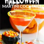 A Halloween party with candy corn martinis and a small black dish of candy corn nearby.
