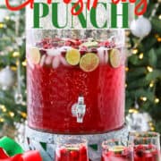 An ad for a Christmas punch recipe with a container full of punch and glasses nearby.