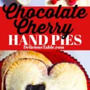 Heart shaped hand pies filled with chocolate and cherries on a red cake stand.