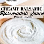 A wooden bowl filled with creamy balsamic horseradish sauce and a wood spoon to spread on dishes.