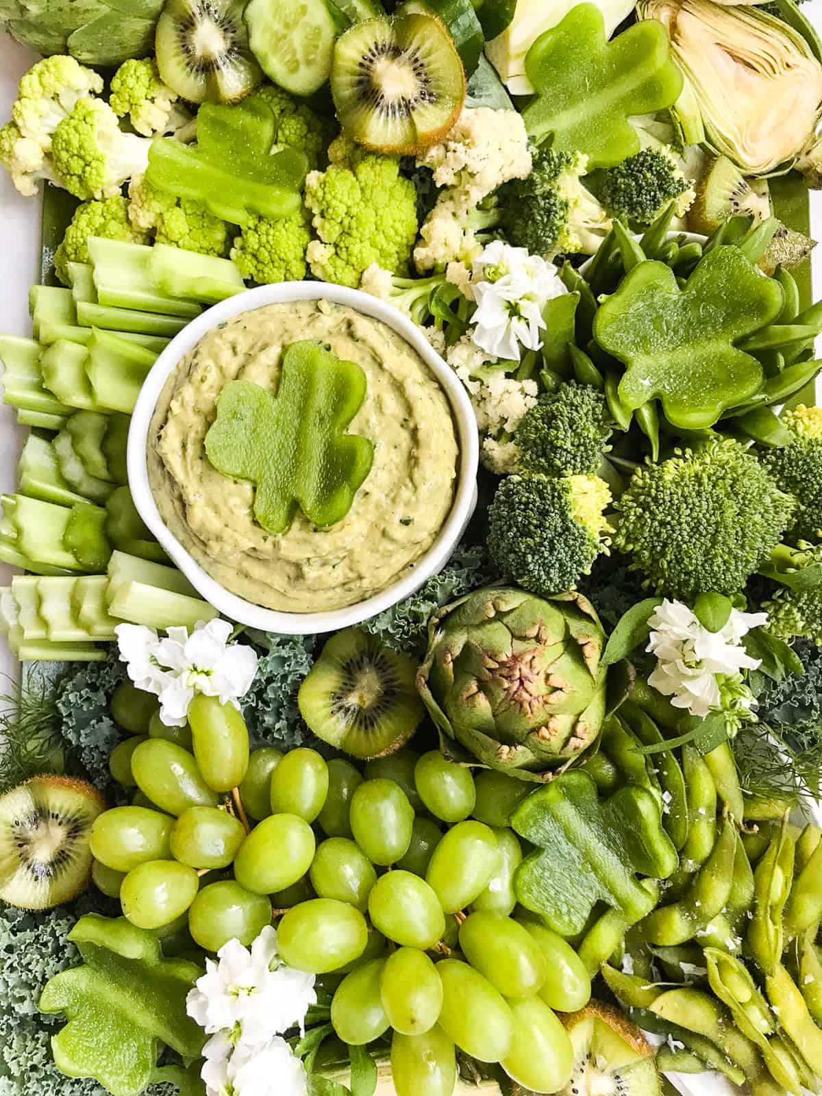 All green food of vegetables and fruits for a snack tray for St. Patrick's Day.