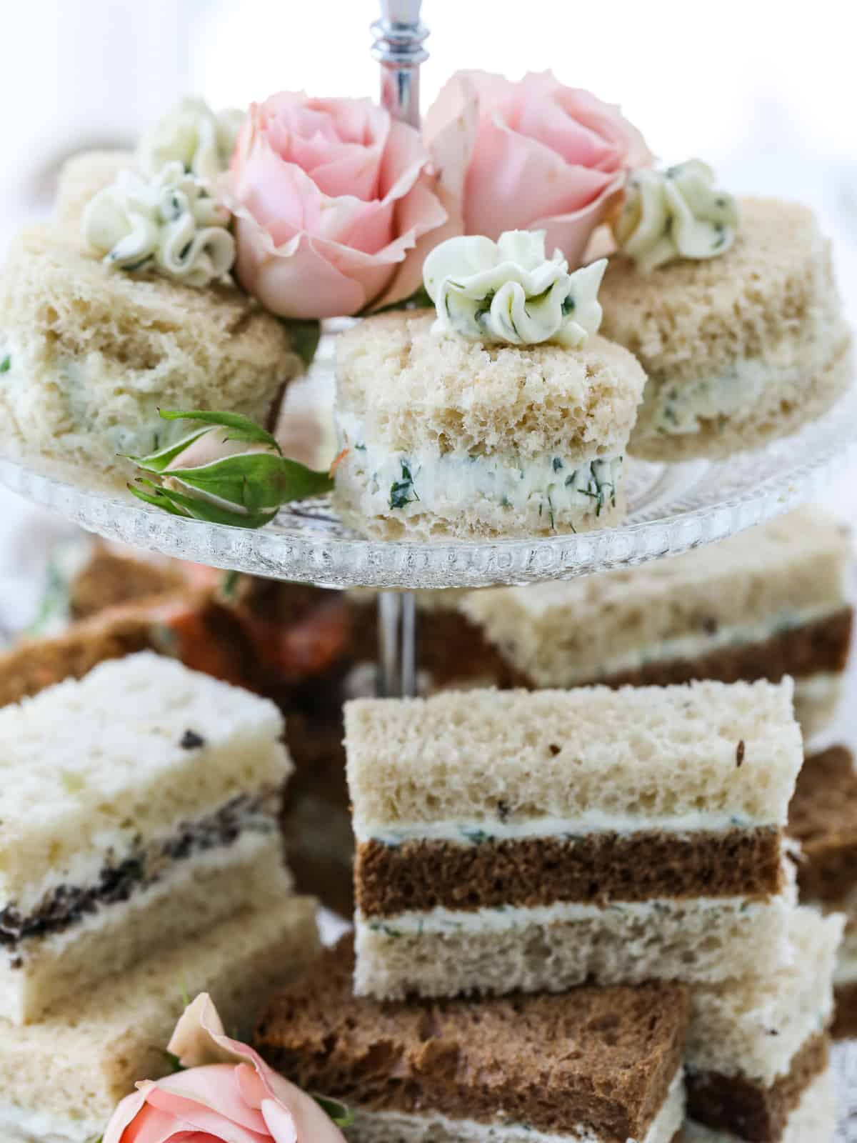 Close up of handmade tea sandwiches on a tray.