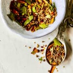 A recipe to make homemade pickling spice in a white bowl.