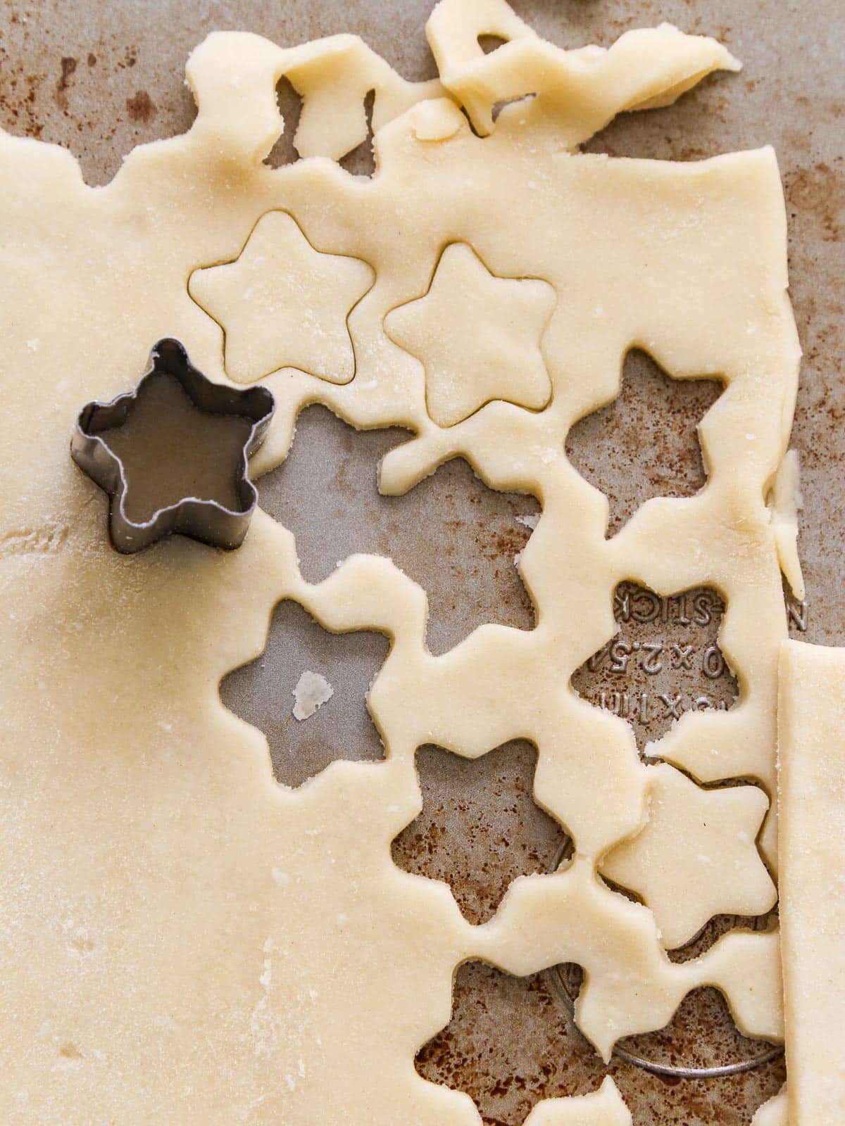Cutting stars from pie dough to decorate a flag pie.
